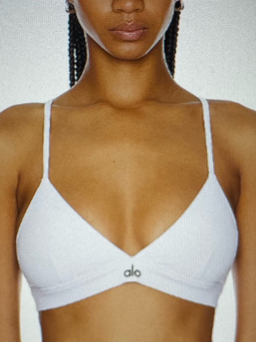 ALO Yoga Ribbed V-Neck Bralette and bottom cropped capri pants.